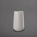 Saigon Tapered Round Fiberglass Planter in matte cement grey against gray background.