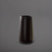 Saigon Tapered Round Fiberglass Planter in matte charcoal against gray background.