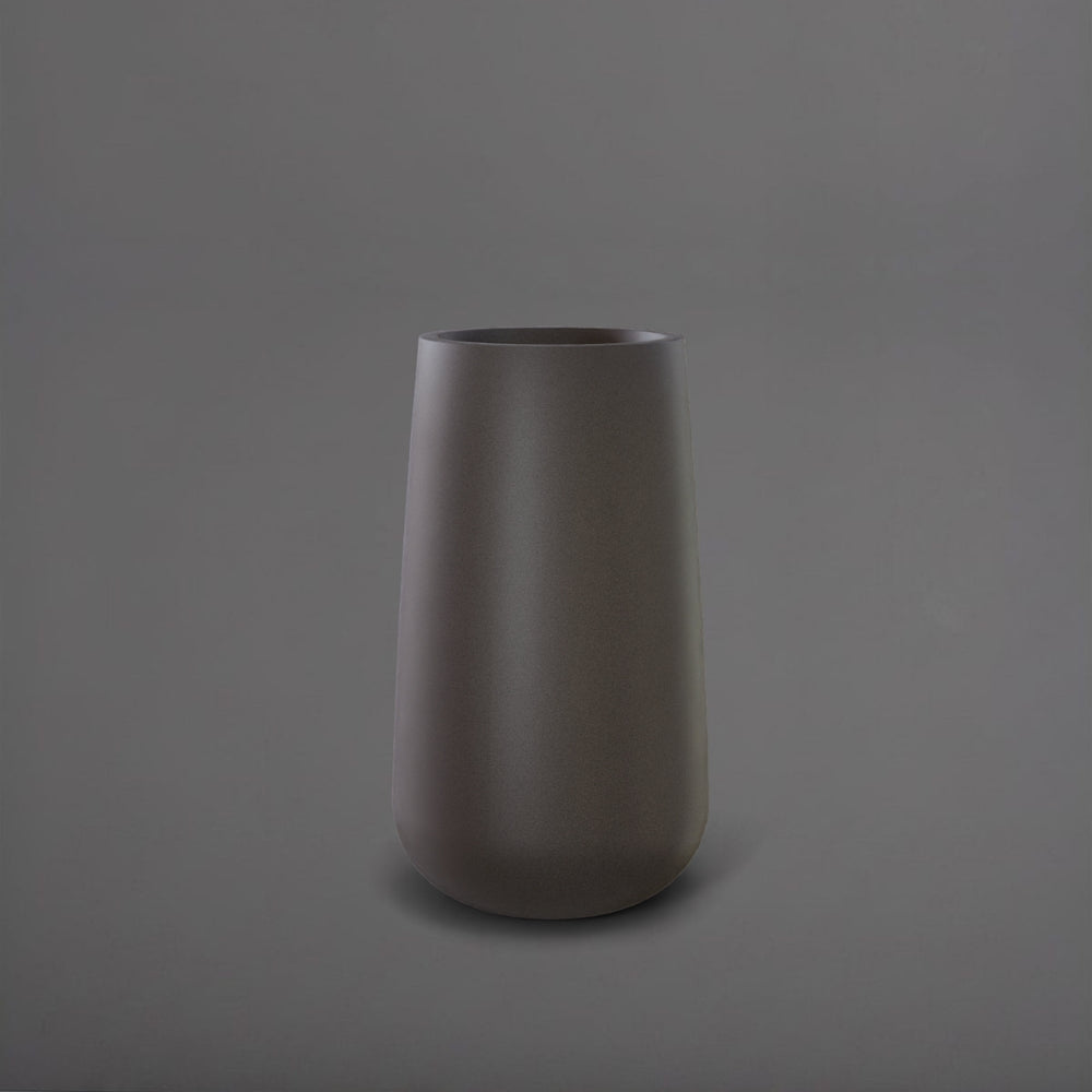 Saigon Tapered Round Fiberglass Planter in matte gunmetal against gray background.