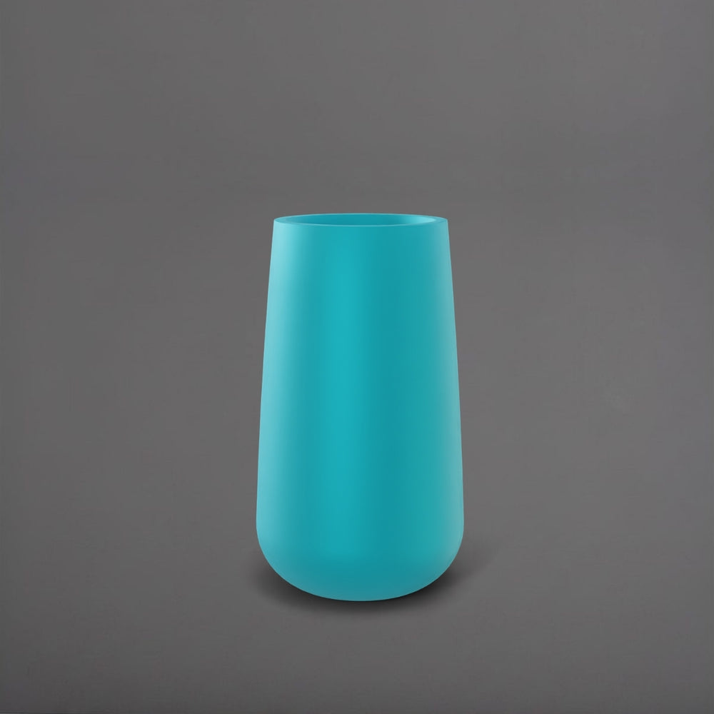Saigon Tapered Round Fiberglass Planter in satin seafoam green against gray background.