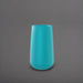 Saigon Tapered Round Fiberglass Planter in satin seafoam green against gray background.