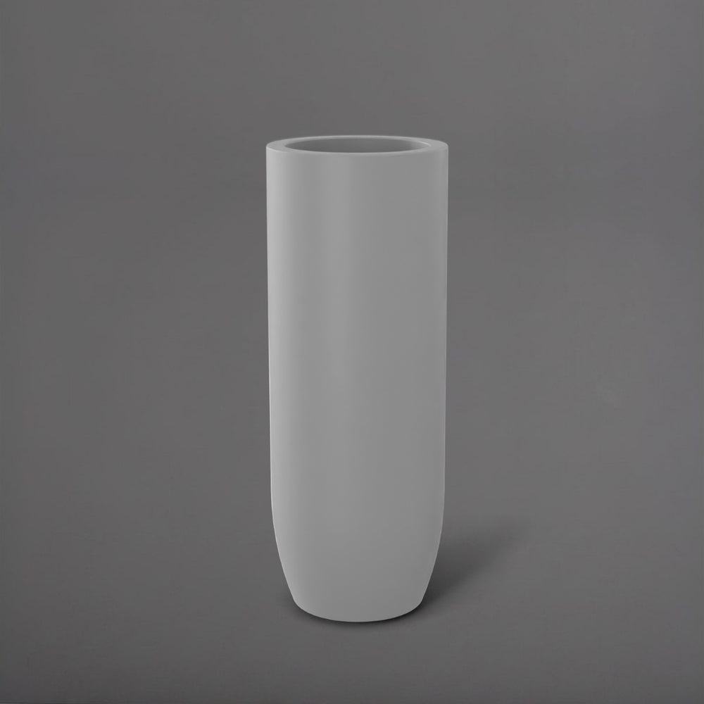 Saint Tropez Tall Bullet Round Fiberglass Planter in matte cement grey against gray background.