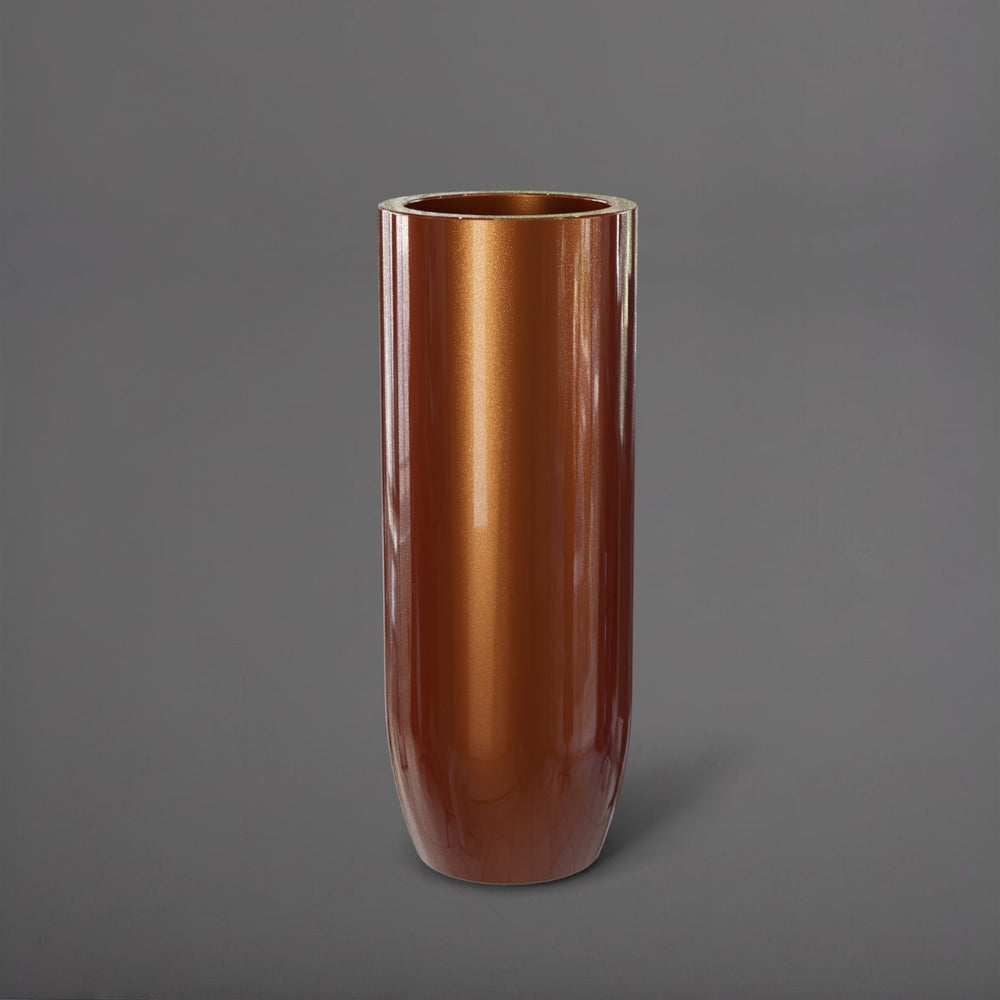 Saint Tropez Tall Bullet Round Fiberglass Planter in metallic bronze against gray background.