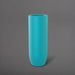 Saint Tropez Tall Bullet Round Fiberglass Planter in satin seafoam green against gray background.