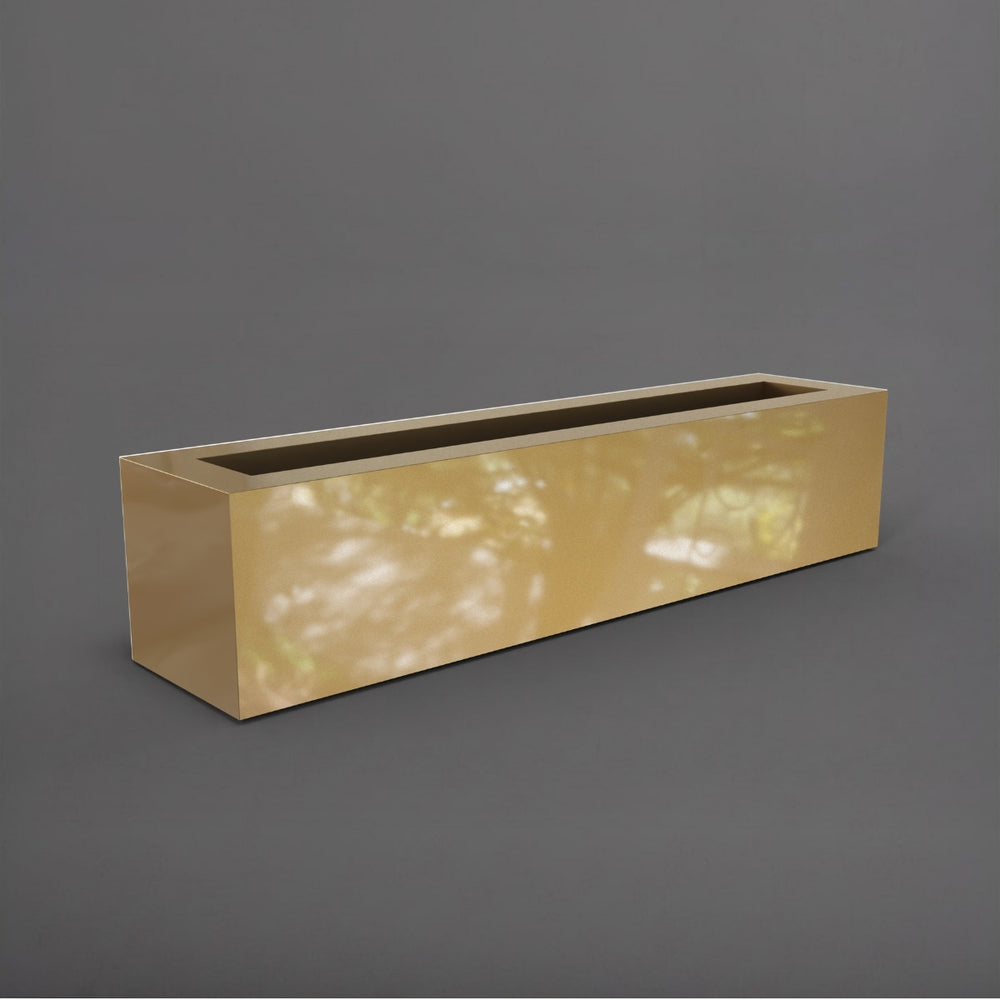 Salon Narrow Rectangle Fiberglass Planter in gloss metallic gold against gray background. 