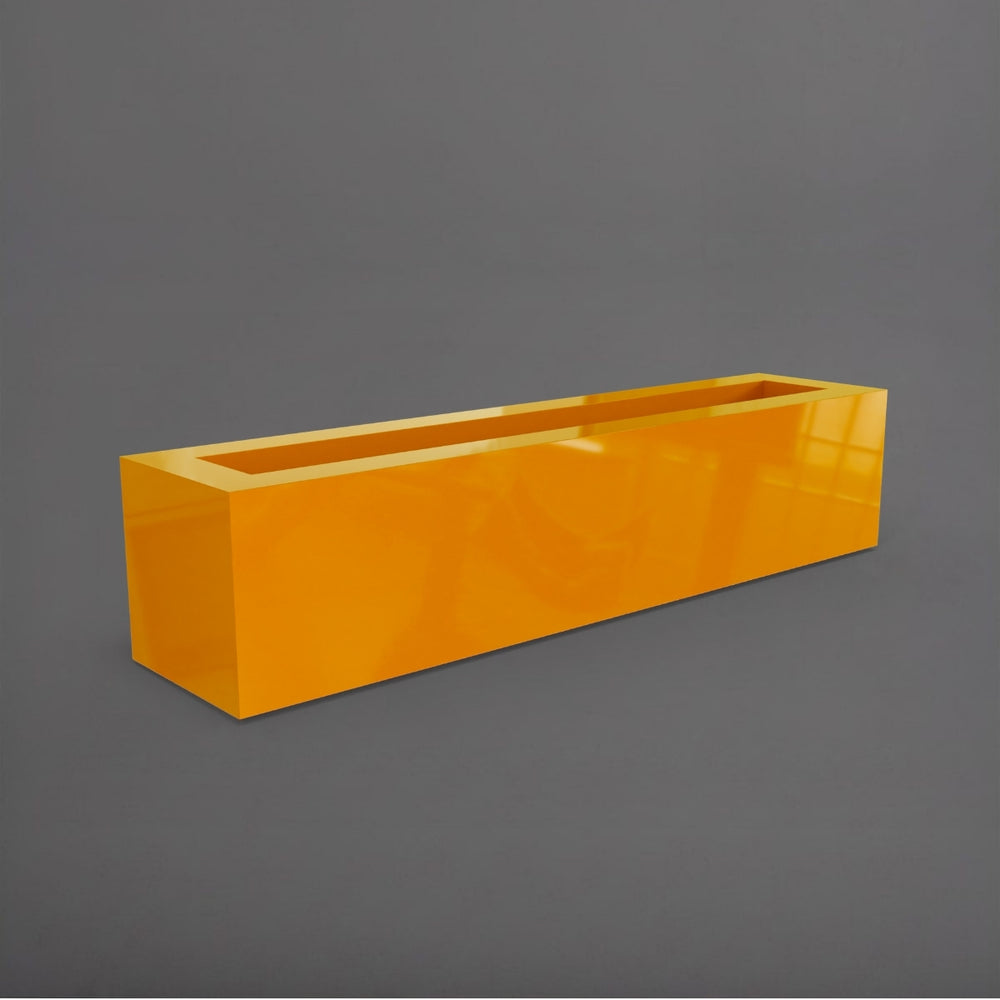Salon Narrow Rectangle Fiberglass Planter in gloss tangerine against gray background. 