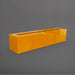 Salon Narrow Rectangle Fiberglass Planter in gloss tangerine against gray background. 