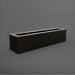 Salon Narrow Rectangle Fiberglass Planter in matte black against gray background. 