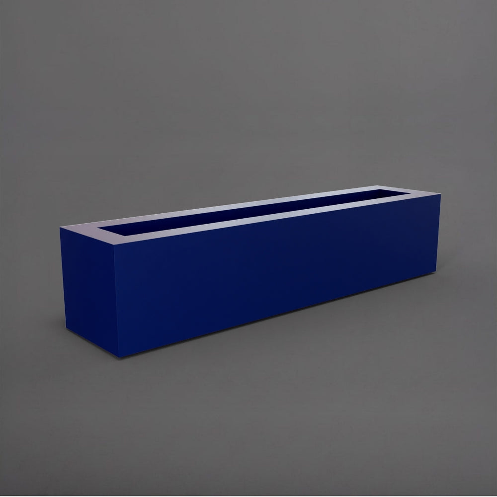Salon Narrow Rectangle Fiberglass Planter in matte cobalt blue against gray background. 