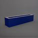 Salon Narrow Rectangle Fiberglass Planter in matte cobalt blue against gray background. 