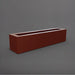 Salon Narrow Rectangle Fiberglass Planter in matte terra cotta against gray background. 