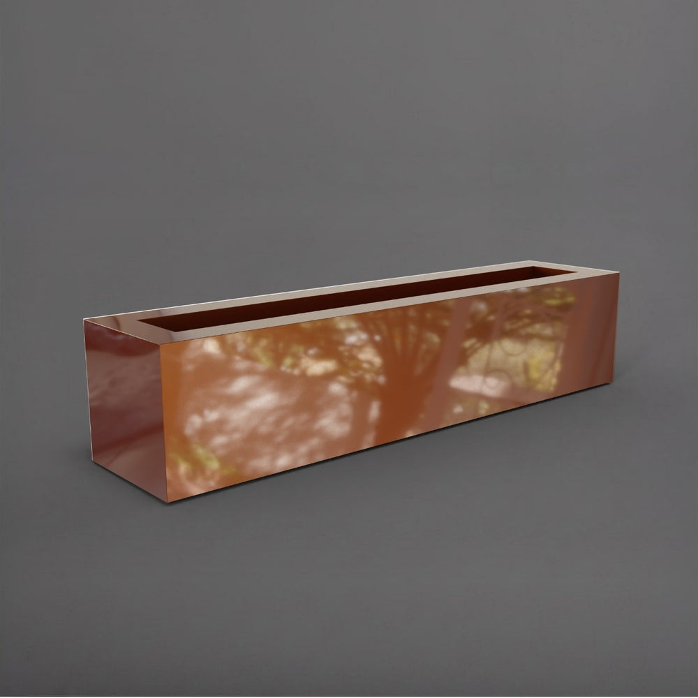 Salon Narrow Rectangle Fiberglass Planter in metallic bronze against gray background. 