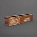 Salon Narrow Rectangle Fiberglass Planter in metallic bronze against gray background. 