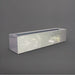 Salon Narrow Rectangle Fiberglass Planter in metallic silver against gray background. 