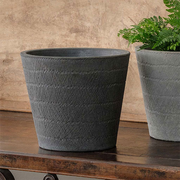 Samba Planter - Charcoal on table beside planter filled with plants