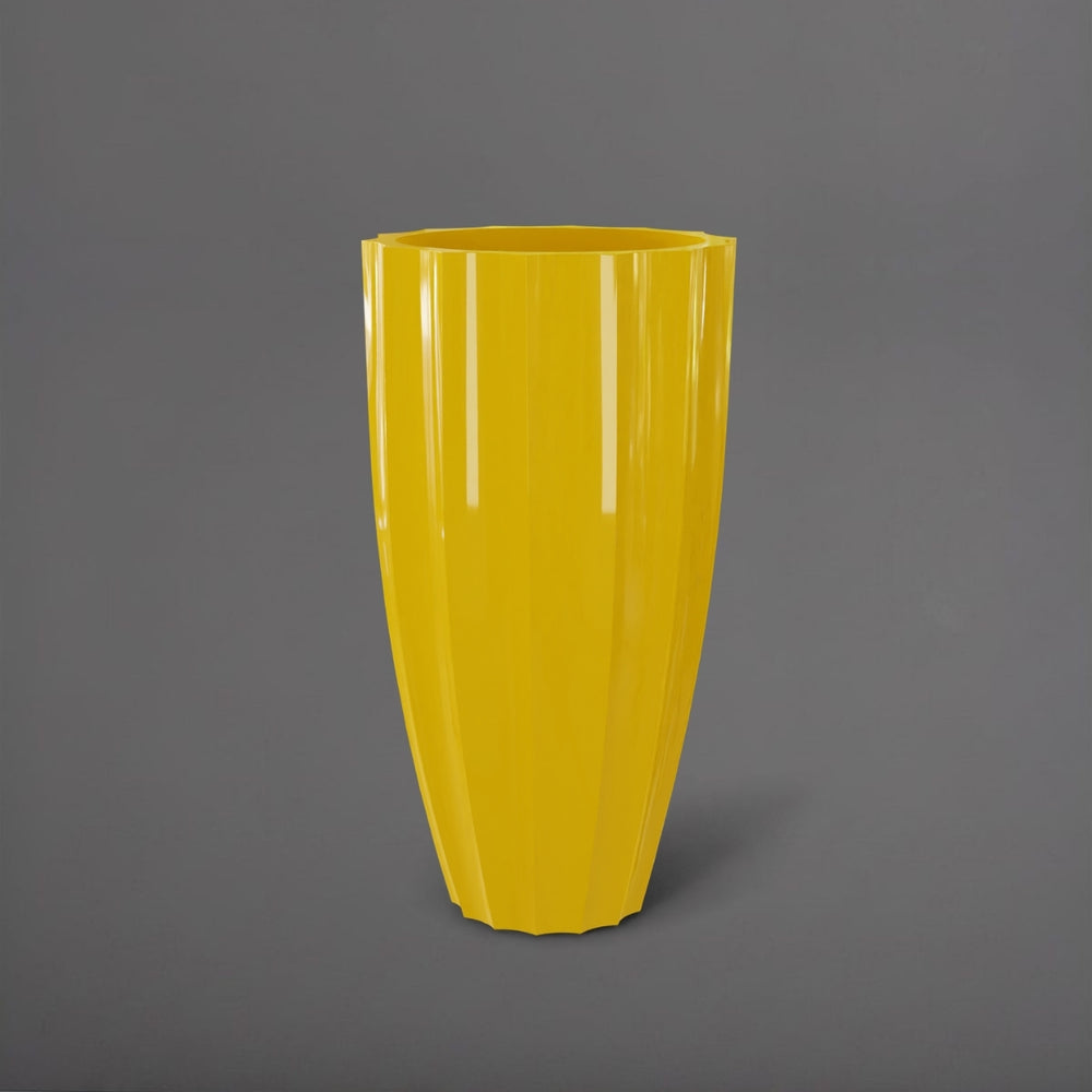 San Jose Tall Fluted Round Fiberglass Planter in gloss saffron against gray background.
