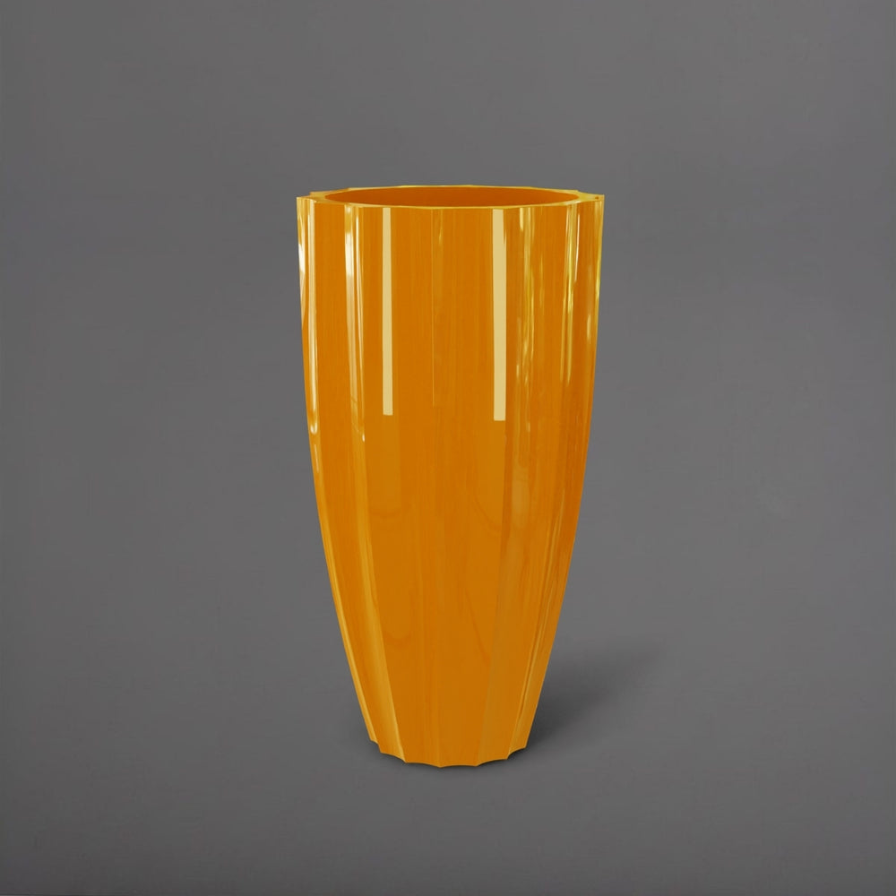 San Jose Tall Fluted Round Fiberglass Planter in gloss tangerine against gray background.