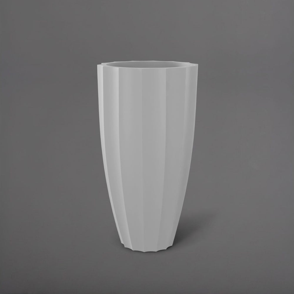 San Jose Tall Fluted Round Fiberglass Planter in matte cement grey against gray background.