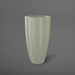 San Jose Tall Fluted Round Fiberglass Planter in satin beige against gray background.