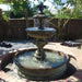 San Remo Fountain in action near fence.