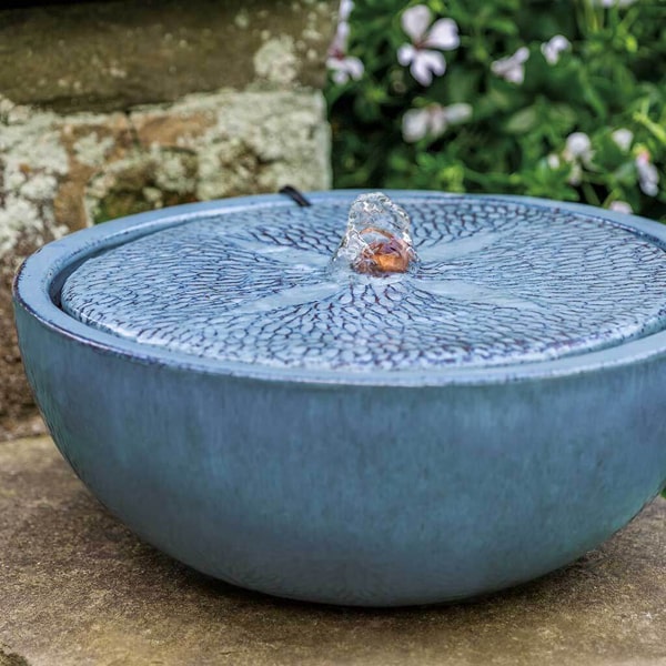 Sand Dollar Fountain in french blue in the backyard