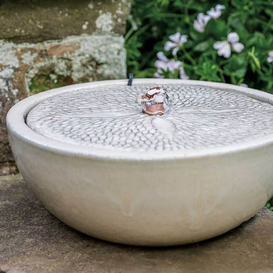 Sand Dollar Fountain in glazed cream in the backyard