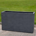 Sandal Planter 591836 S/1 in charcoal premium lite on concrete in the backyard.