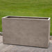 Sandal Planter 591836 S/1 in riverstone premium lite on concrete in the backyard.