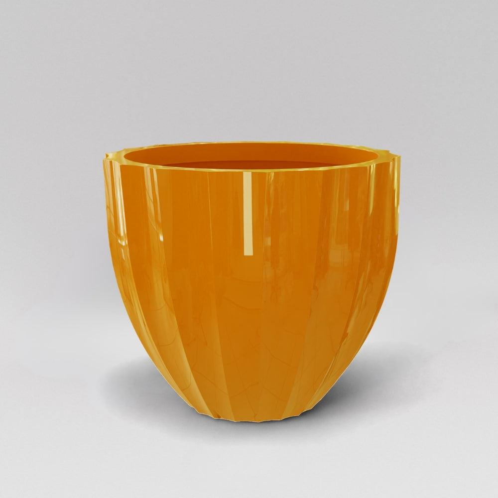 Santa Barbara Fluted Round Fiberglass Planter in gloss tangerine against gray background.