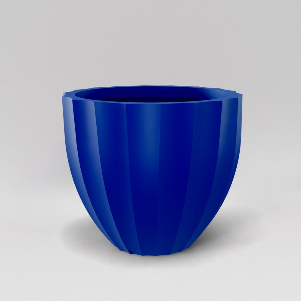 Santa Barbara Fluted Round Fiberglass Planter in matte cobalt blue against gray background.