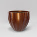 Santa Barbara Fluted Round Fiberglass Planter in metallic bronze against gray background.