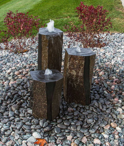 Semi Polished Basalt Fountain Kit on black pebbles in action