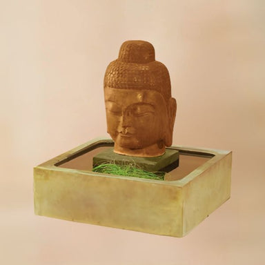 Serene Buddah Fountain against brown background.