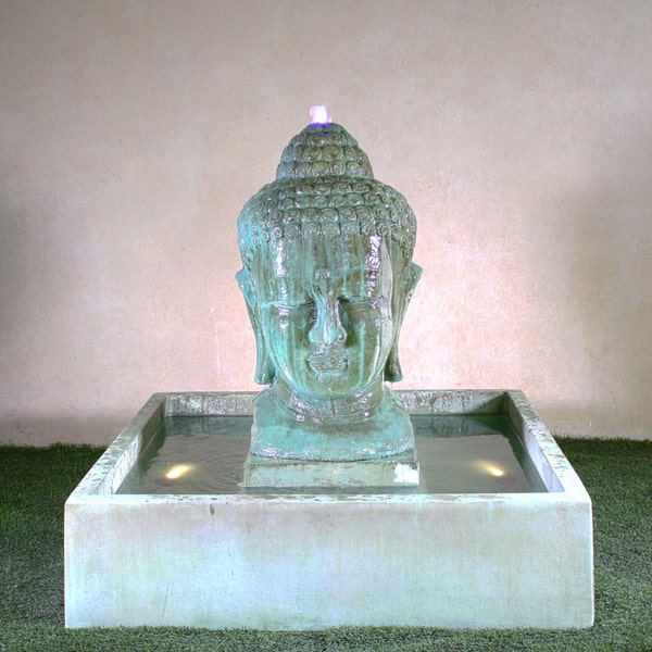 Serene Buddha Courtyard  Fountain on grass in action.