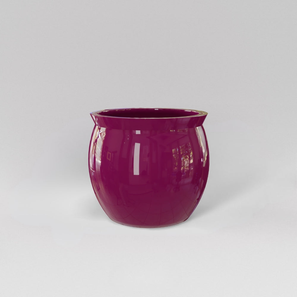 Shanghai Fishbowl Fiberglass Planter in gloss eggplant against gray background.
