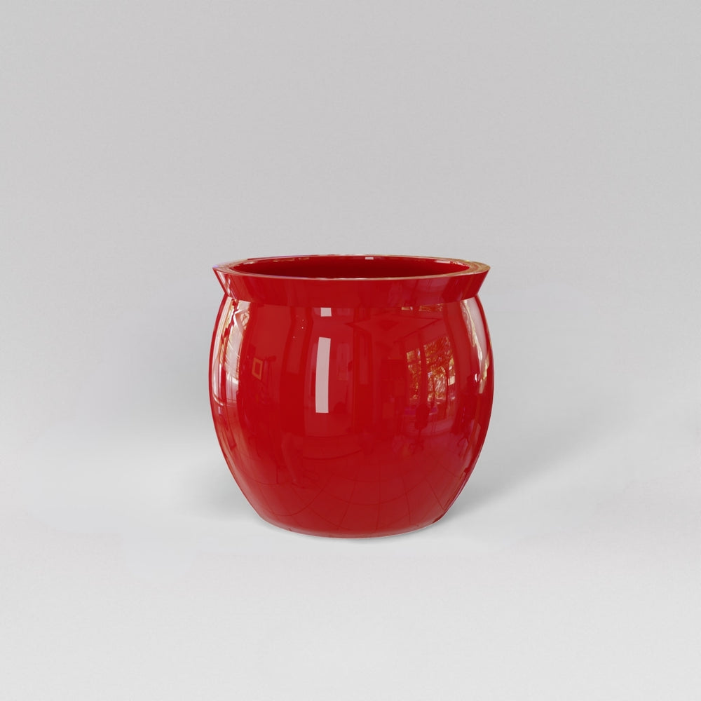 Shanghai Fishbowl Fiberglass Planter in gloss red against gray background.