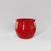 Shanghai Fishbowl Fiberglass Planter in gloss red against gray background.