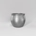 Shanghai Fishbowl Fiberglass Planter in metallic silver against gray background.
