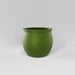 Shanghai Fishbowl Fiberglass Planter in satin green against gray background.