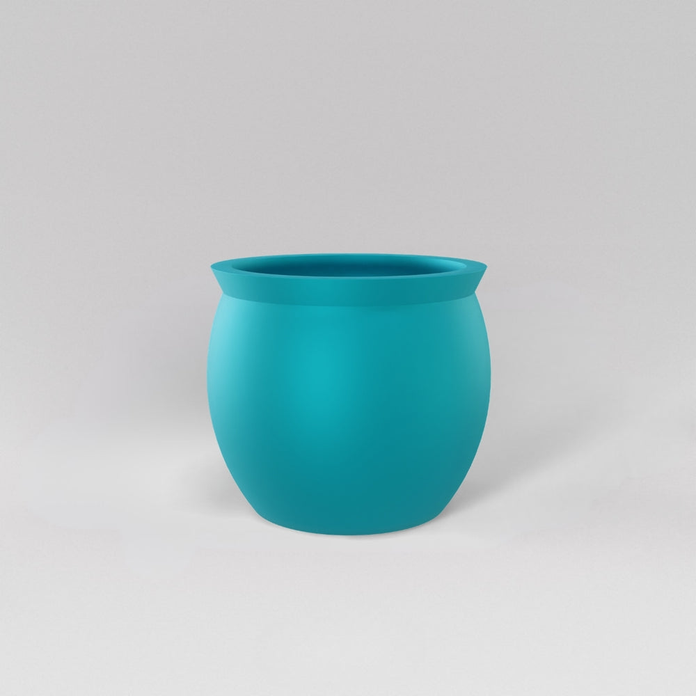 Shanghai Fishbowl Fiberglass Planter in satin seafoam green against gray background.