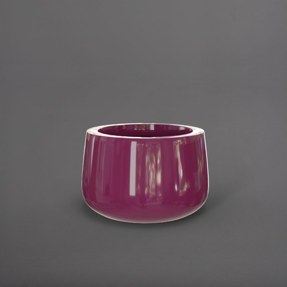 Short Hayden Tapered Round Fiberglass Planter in gloss eggplant against gray background.