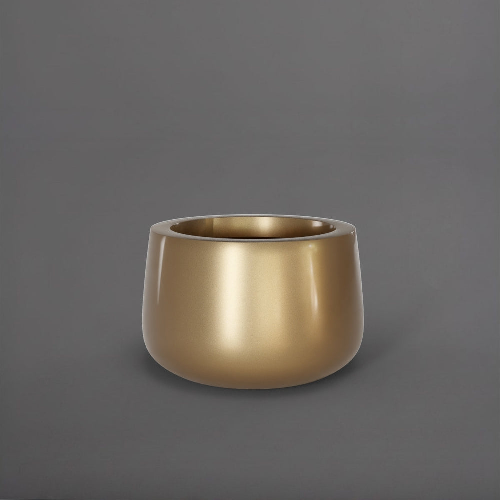 Short Hayden Tapered Round Fiberglass Planter in gloss metallic gold against gray background.