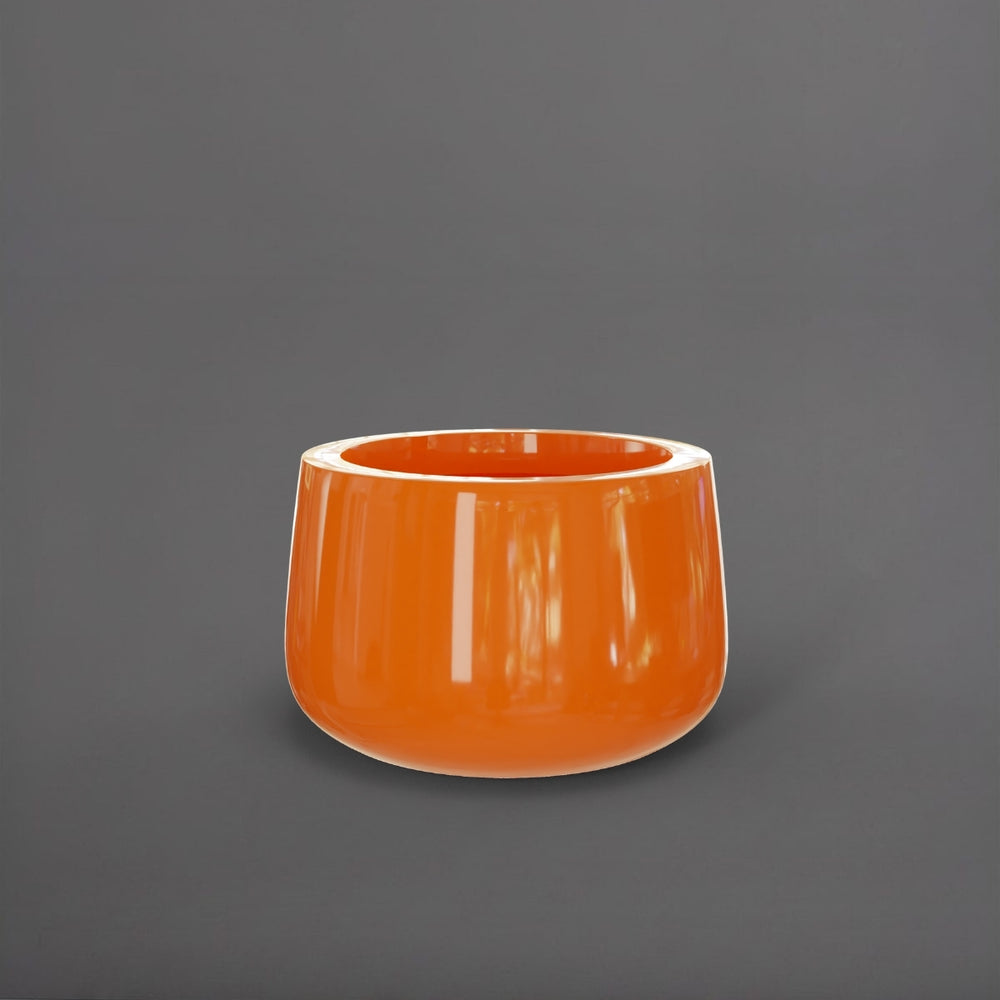 Short Hayden Tapered Round Fiberglass Planter in gloss tangerine against gray background.