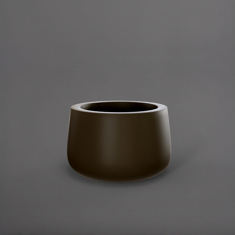 Short Hayden Tapered Round Fiberglass Planter in matte bronze against gray background.