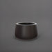Short Hayden Tapered Round Fiberglass Planter in matte charcoal against gray background.