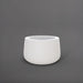 Short Hayden Tapered Round Fiberglass Planter in matte white against gray background.