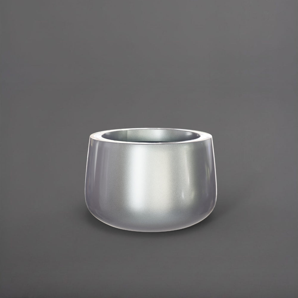 Short Hayden Tapered Round Fiberglass Planter in metallic silver against gray background.