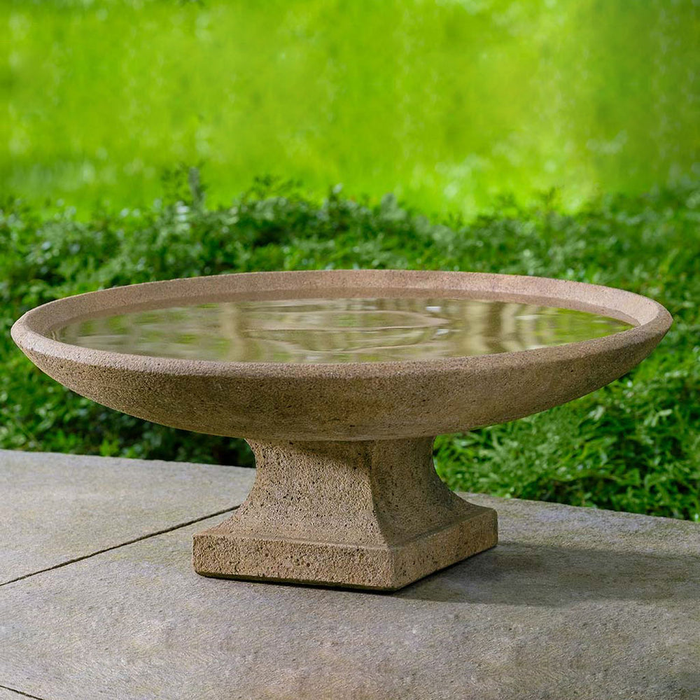 Sonora Birdbath on concrete in the backyard