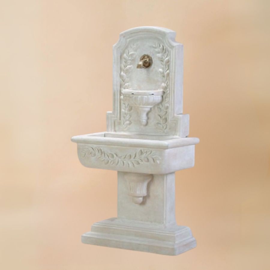 Sorrentine Wall Fountain for spout against brown background.