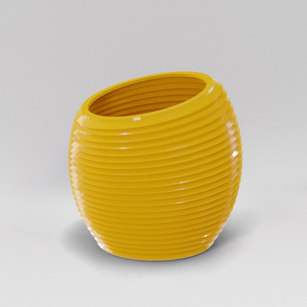 Spiral Globe Fiberglass Planter in gloss saffron against gray background.